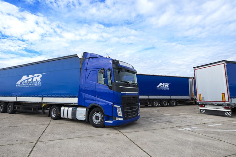 Truck vehicle with trailers in background